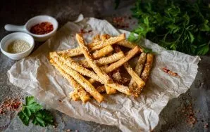 Bake the sticks at 180 degrees in an already preheated oven for 15 minutes.