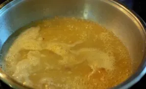 Then pour the wine into the same pan and cook a little, stirring. then pour in the broth.