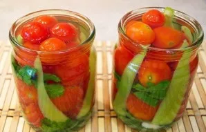 Pour boiling water into the jars and leave for 15 minutes, do not close. In the meantime, we will make the marinade. Pour water into a po...