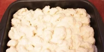 At the end, pour in the prepared sauce and place the baking sheet in an oven preheated to 180 degrees. When the dish is covered with a go...