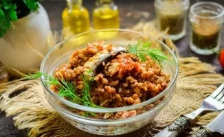 Buckwheat with sprats in tomato sauce