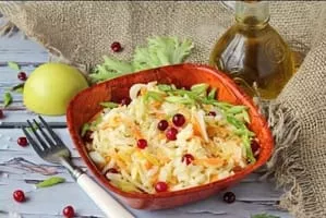 Cabbage salad with cranberries and apples