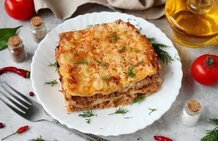 Meat lasagna with mushrooms and Bechamel sauce