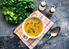 Pumpkin soup with smoked meats