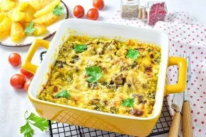 Saida with champignons sour cream in the oven