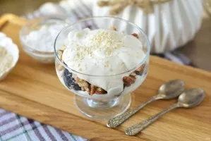 Dessert of plums and sour cream