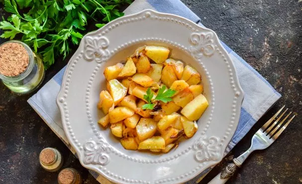 Baked potatoes in a jar in the oven