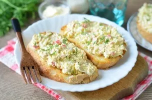 Sandwiches with crab sticks and melted cheese