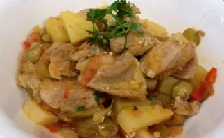 Rabbit stewed with potatoes in the oven