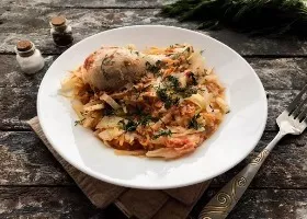 Chicken drumsticks with stewed cabbage