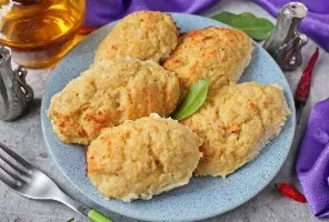 Fish cutlets with cottage cheese in the oven